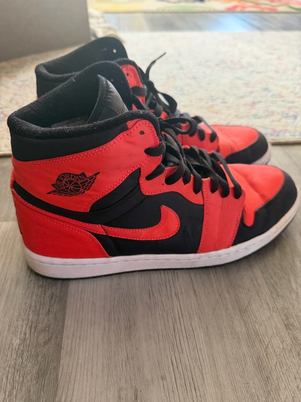Jordan Black and Orange AJ1 Sneakers